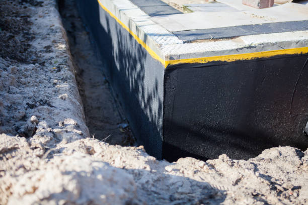 Professional Waterproofing technician working in Greenville, GA
